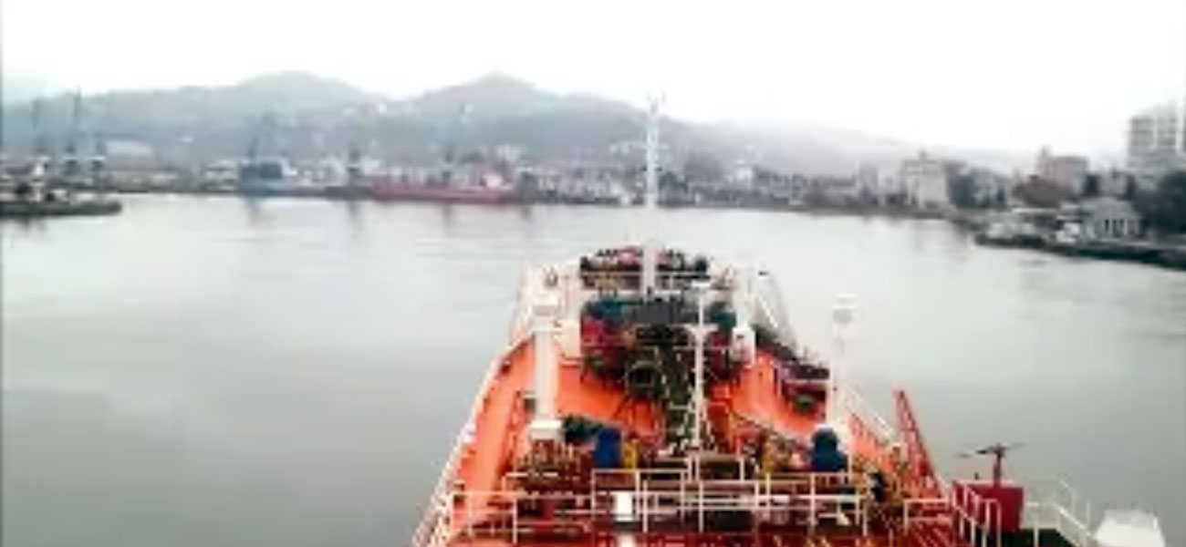 The LPG ship maneuvering in the port